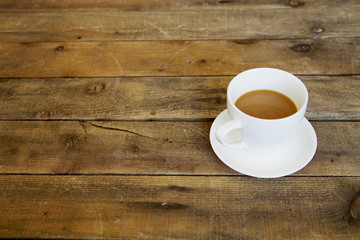 Coffee cup on wooden table