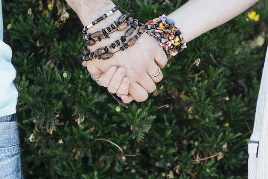 Horizontal Closeup photo of a heterosexual couple's hands