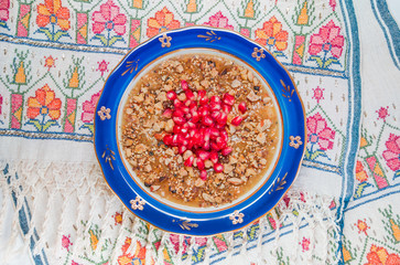 Turkish dessert Ashura, Noah's pudding, with pomegranate seeds