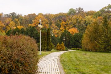 Beautiful autumn landscape with street lantern 