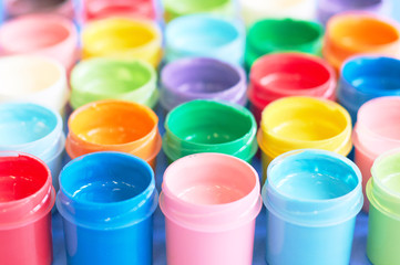 background of jars with colored paints
