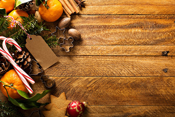 Christmas background with oranges, candy canes and decorations
