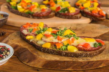 Sandwiches with sausage,cheese and pepper