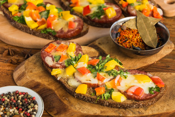 Sandwiches with sausage,cheese and pepper