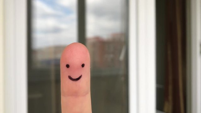 Funny finger people smiling window Happy finger art smiley face blurred distor