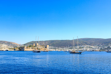Bodrum castle from sea with boats in Bodrum, Turkey