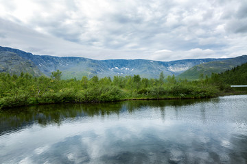 Fototapeta na wymiar Lake in the mountains, beautiful scenery