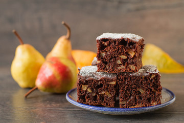 Chocolate cake with pears in rustic style