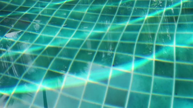 Water in swimming pool reflection wave background
