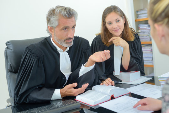 successful lawyer giving consultation to a woman