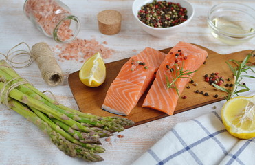 Salmon Fish Cooking Raw Fillet Pepper Salt Olive Oil Rosemary Lemon Green Asparagus Wooden Table Lifestyle Healthy Concept