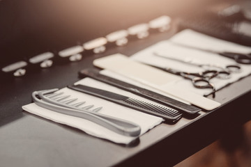 hairdresser's tools: combs, razors, scissors, clip-on hair clipper