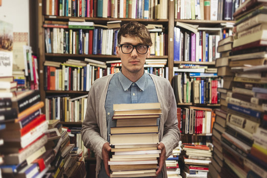 Young man in a book store