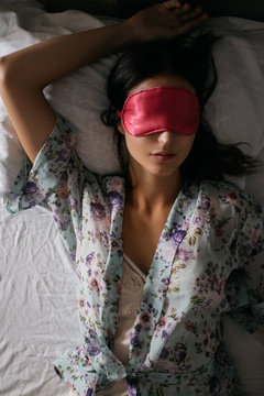 Beautiful Woman Sleeping in Bed