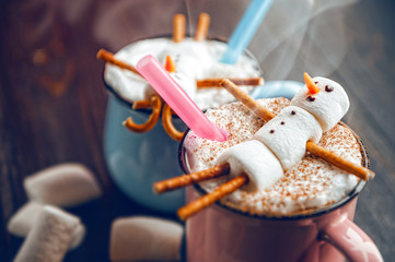 mugs with hot chocolate in which the men from the zyphira relax. concept of a couple