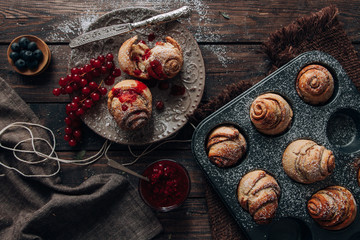 Homemade cinnamon rolls with raspberries glaze