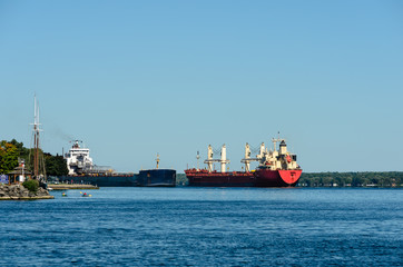 Two Freight Ships passing closely