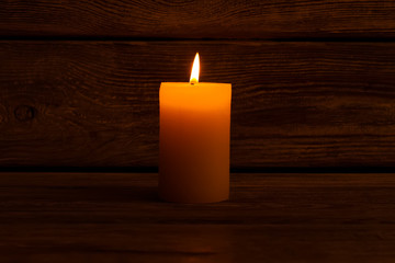 Obraz na płótnie Canvas Burning pillar candle