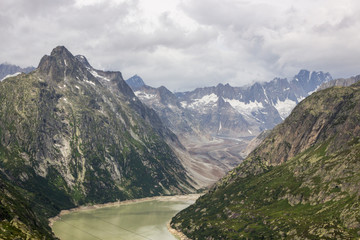 Oberaar panoramic mountain road and glacier in Switzerland in Alps