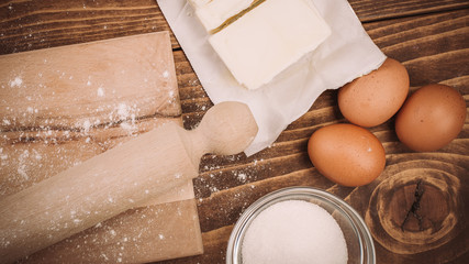Dough recipe ingredients on vintage rural wood kitchen table