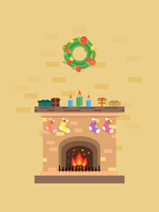 Christmas fireplace with wreath,candles,gifts and decorative socks 