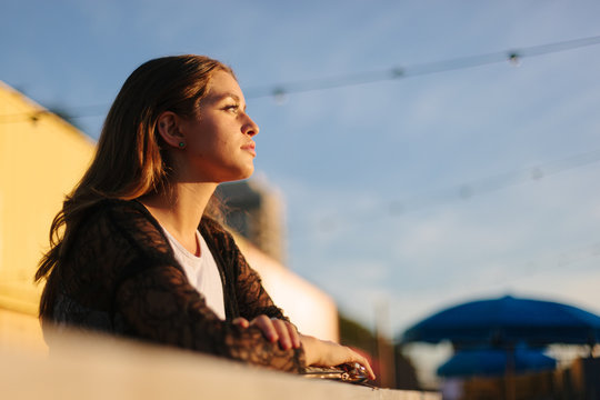 Portrait of a woman enjoying the sun