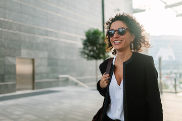 Businesswoman walking in the business district