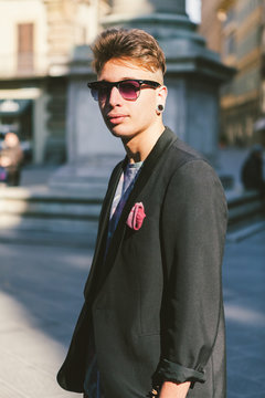 Urban Young Man with Suit and Sunglasses