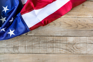 American flag over wooden background