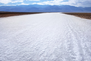 Fototapeta na wymiar Salty path at Badwater Basin (Death Valley National Park), California, USA