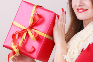 Woman with red christmas gift box