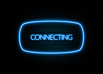 Connecting  - colorful Neon Sign on brickwall