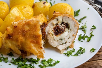 Chicken breast stuffed with cheese and dried tomatoes.