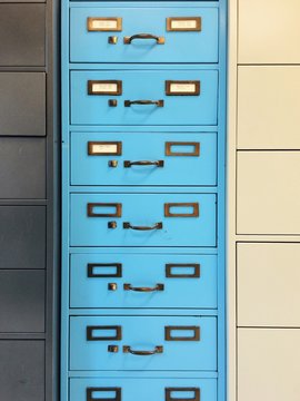 Really Fun File Cabinet Between Two Boring File Cabinents