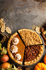 Fall traditional pies pumpkin, pecan and apple crumble © fahrwasser