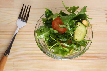 vegetable salad on a wooden background