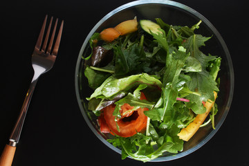 vegetable salad on a black background
