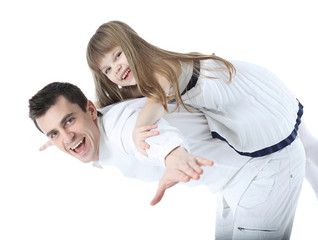 Young father playing with his little baby