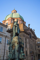 Fototapeta na wymiar Statue of Charles IV in front of the Church of St. Francis of Assisi at the Old Town in Prague, Czech Republic.