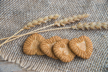 cookies in the form of heart from whole-grain flour on a linen napkin and ears