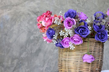 Flowers purple color in the basket near wall loft style