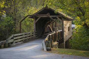 Simple historic covered bridge in warm sunset light