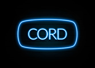 Cord  - colorful Neon Sign on brickwall