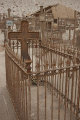 Historic cemetery from the era of nitrate mining in the Atacama Desert, at Pisagua on the coast of...