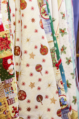 New Year's textiles, fabric with a Christmas print, pattern. Vertical background