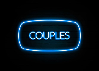 Couples  - colorful Neon Sign on brickwall