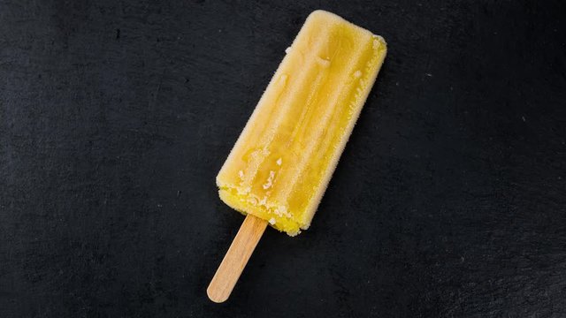 Melting fruity ice in 4K UHD timelapse footage (close-up)