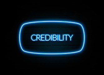 Credibility  - colorful Neon Sign on brickwall
