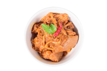 Northern Thai food (Kaeng Hang Le),spicy curry pork mixed with spices.Northern Thai curry dish isolated on white background