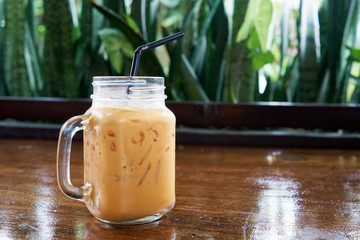 Teh tarik or pulled tea is a famous sweet milk tea in Malaysia. Bubble is floating on the surface...